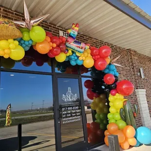 a colorful balloon arch