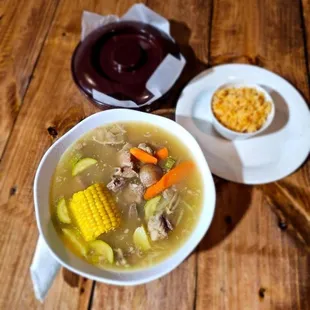 Caldo with a side of rice and tortillas