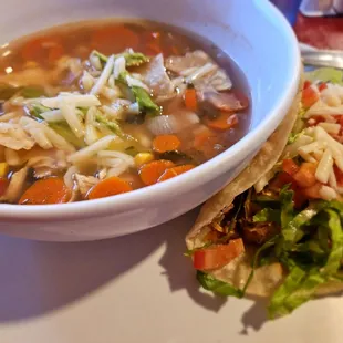 Delicious tortilla soup and taco combo.