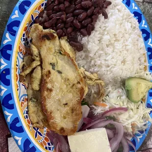 Grilled Chicken, rice, beans, cheese and pickled onions.