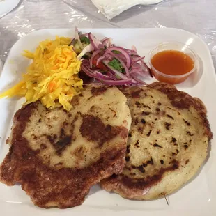 Papusas filled with beans and cheese.