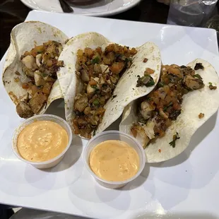 This is the grilled fish tacos with a chipotle sauce.