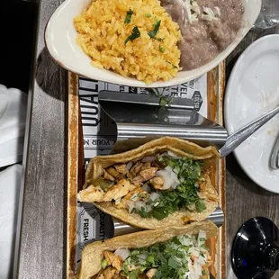 Chicken tacos with rice and beans
