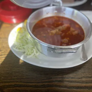 Posole served in a cute pot