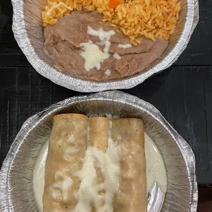 Chicken flautas, beans, &amp; rice.