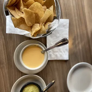 Chips and queso and green salsa