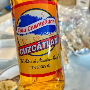 a bottle of cola champagne