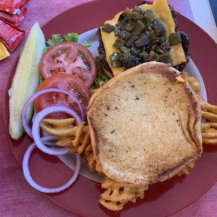 Green chile cheeseburger with waffle fries