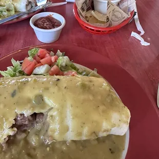 Special vegan bean burrito smothered.