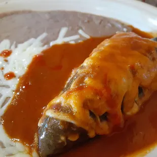 Chili relleno with refried beans.