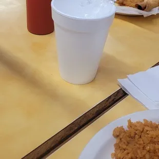 The cup of ice i asked for after she brought us water bottles