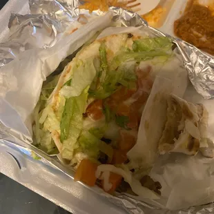 A moistened steak taco dinner... featuring soggy lettuce and tomatoes &amp; outdated sour cream