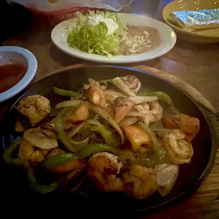 Lunch serving of shrimp fajitas