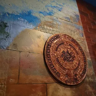 a decorative medallion on the wall