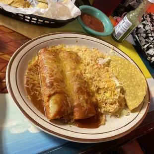 Combination # 1, two enchiladas and one taco and rice