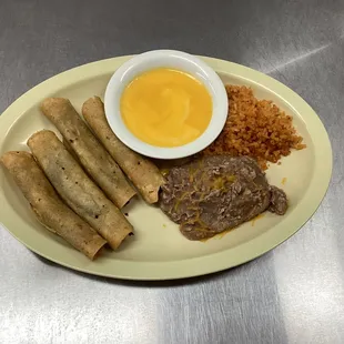 Ground Beef Taquito Plate w/nacho cheese