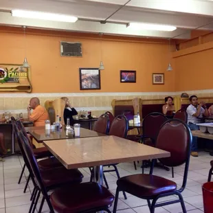 Kitchen-like atmosphere. No music, echoing tile floors, barely decorated w/what looks like hodge-podge art from a thrift store.