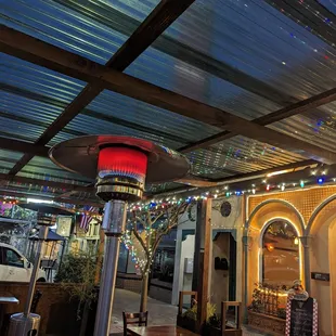 Outdoor patio with heat lamps - there were several tables. Heat lamp kept us very warm on an otherwise chilly night!