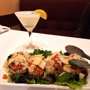 Bruschetta- Diced tomatoes mixed with basil, garlic, capers, served over grilled slices of bread with shaved parmesan cheese