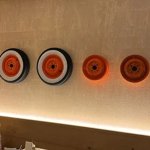 orange plates on the wall