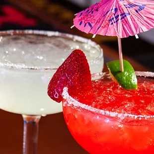 two margaritas with umbrellas