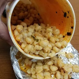 I ordered a large menudo to go and I had asked the girl not to  put much harmony .This is what I got a whole  bunch of harmony...