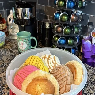 My favorite conchas got to have one of each color. The other is like a pound cake center with a flaky sugary crust all around it.