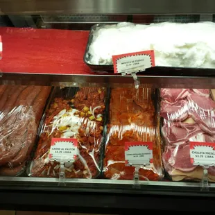 House made longaniza, al pastor, rendered pork fat, pork chops, and more seasoned pork.