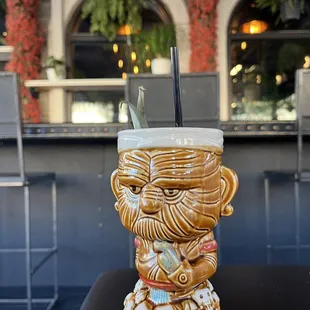 a cup with a straw in it