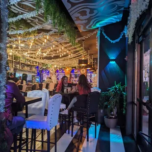 people sitting at a bar