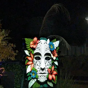 a colorful mask in the night