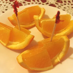 Orange slices on the house for a refreshing and rejuvenating dessert. This wasn&apos;t expected, but what a treat.