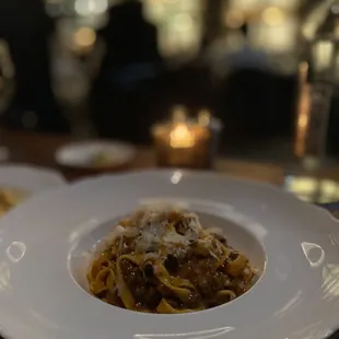 a plate of pasta on a table