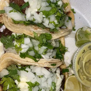 Three barbacoa tacos with added cheese! $10.50