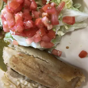 Tamale. Maybe fried?