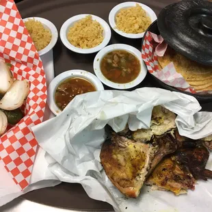 Whole bird meal includes charro beans for 2, 2 rice portions, 8 corn tortillas, grilled onions and jalapeños.