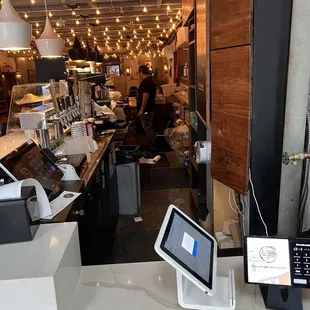 Employee drops paper towels and leaves on floor.