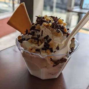 Make your own sundae with banana, coconut and straticella.