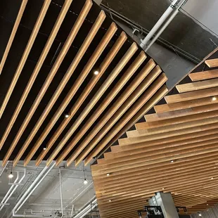 a view of a ceiling with wooden slats