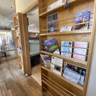 a bookshelf in a coffee shop