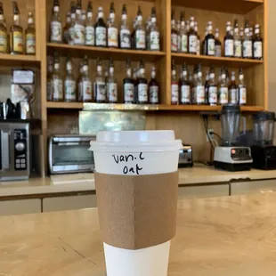 a cup of coffee on a counter