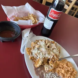 I got chilaquiles with a coke. They also serve you chips and salsa while they prepare your meal