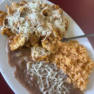 I decided to go with red Chilaquiles, this meal comes with rice and beans