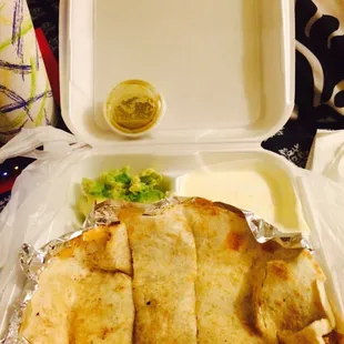 Super quesadilla (sour cream and guacamole) with carnitas (pork). Always a winner.