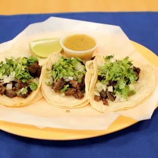 three tacos on a plate