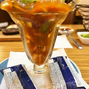 a sundae with ice cream and fruit