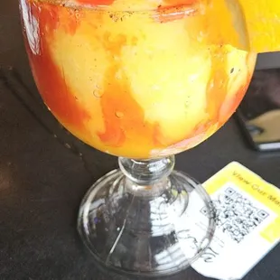 Mangonada margarita. . The perfect amount of everything This is a must have specialty cocktail!!