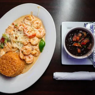 a plate of food and a bowl of soup