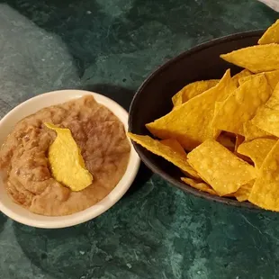 Complementary chips, baked beans and salsa