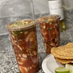 a plate of tortillas and a cup of salsa